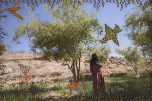 Embroidered photograph of Hajja Oum Mohamed (53) in her garden in Gharba Valley. Embroidery by her.