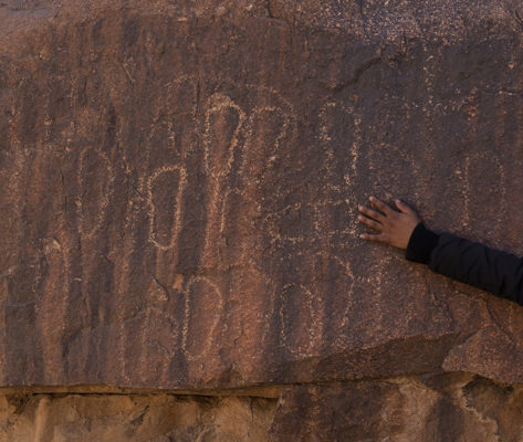 Foot engravings from past Bedouin guides throughout decades.